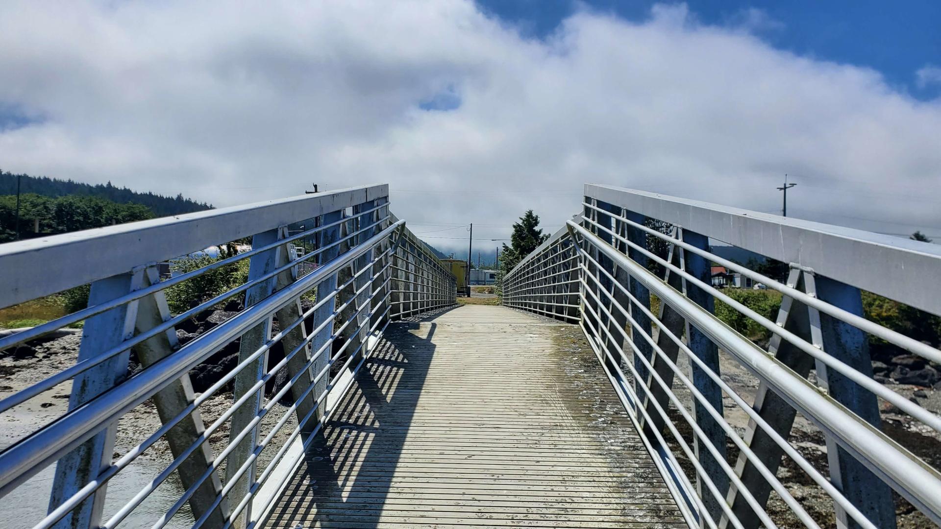 A photograph of a walkway angled upwards.